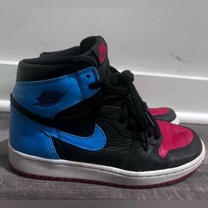 Well worn authentic Nike Air Jordan 1s Retro High. Blue, red and black. Size 7.5